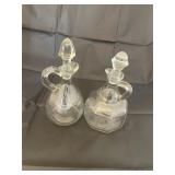 Pair of vintage clear glass cruet bottles