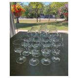 Assorted set of clear glass stemware and goblets