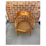 Vintage wooden captain chair with springs