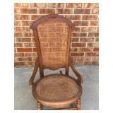 Antique wooden cane seat rocker