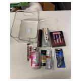 LARGE ASSORTMENT OF COSMETICS W/ STORAGE BIN