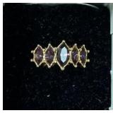 GOLD COLORED RING WITH 5 STONES