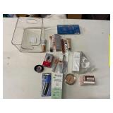 LARGE ASSORTMENT OF COSMETICS W/ STORAGE BIN