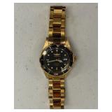 GOLD AND BLACK INVICTA WATCH