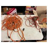 (2)- EXTENSION CORDS AND CORDED WORK LIGHT