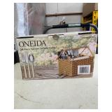 ONEIDA FLATWARE SET WITH WICKER CADDY
