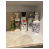Shelf lot of cleaning laundry supplies