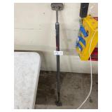 Spring loaded adjustable load lock