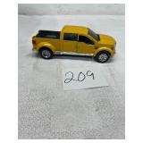yellow Ford F-350 Super Duty diecast 1/31Maisto