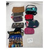 Lot of small purses, clutches, and wallets