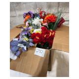 Large box of artificial fake flowers