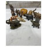 Large lot of ceramic elephants with losses