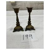 Set of matching brass candlestick holders