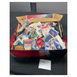 shoe box full of unsorted sports cards