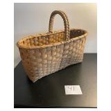 large wicker woven  basket with handle