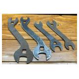 Four Antique John Deere Implement Wrenches