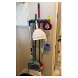Broom and Mop Holder with Cleaning Tools