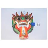 wood carved mask damaged