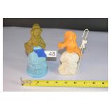 pair of avon cologne bottles half full