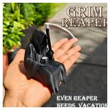 'Death also needs a vacation' Gothic statue of...