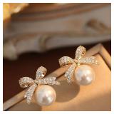 Sparkling Rhinestone Bow Pearl Stud Earrings...