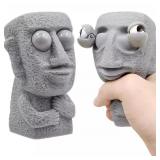 Stone man releases stress toy slowly rebounds...