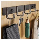 Hooks for hanging clothes at the entrance door,...