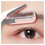 Pink eyebrow trimming scissors with built-in...