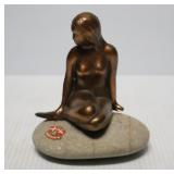 Metal Mermaid on Stone