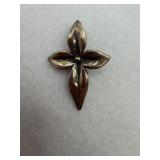 Sterling silver flower cross pendant having four
