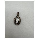 A sterling silver pendant onyx stone with pearl