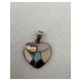 A sterling silver with a mosaic inlay with stone