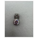 Sterling silver pendant with diamond stone.