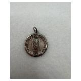 Vintage sterling silver pendant has Saint Jude.