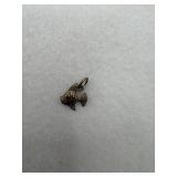 Sterling silver fish charm with a scale pattern
