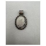 A Mexico sterling silver pendant, appears to be
