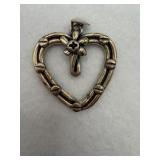 Sterling silver heart pendant with a screw like