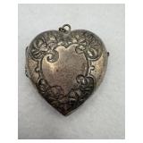 Sterling silver heart locket with design