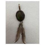 Sterling silver Navajo design with a green opal