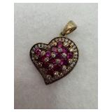 Sterling silver heart pendant with a pattern of