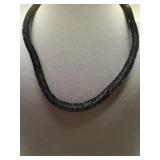 Sterling silver chain in the back with faux