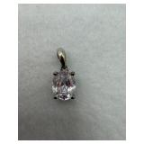 Sterling silver four prong pendant with a oval