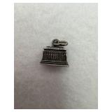 Sterling silver charm that resembles a 3D