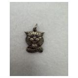 A sterling silver bobcat charm pendant