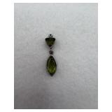 Sterling silver pendant with two green stones