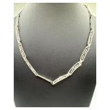 A sterling silver a Greek key pattern necklace,17