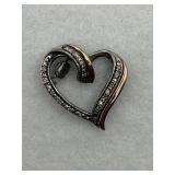 Sterling silver heart pendant with a diamond