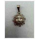 Sterling silver sun face pendant