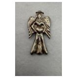 Sterling silver angel charm detailed wings and