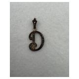 The letter D charm made of sterling silver with